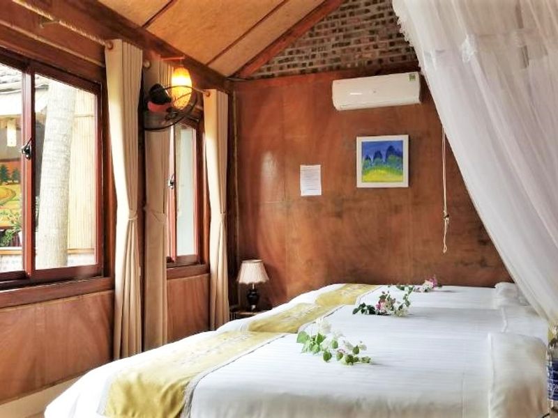 justfly phong triple view vuon green peace bungalow ninh binh