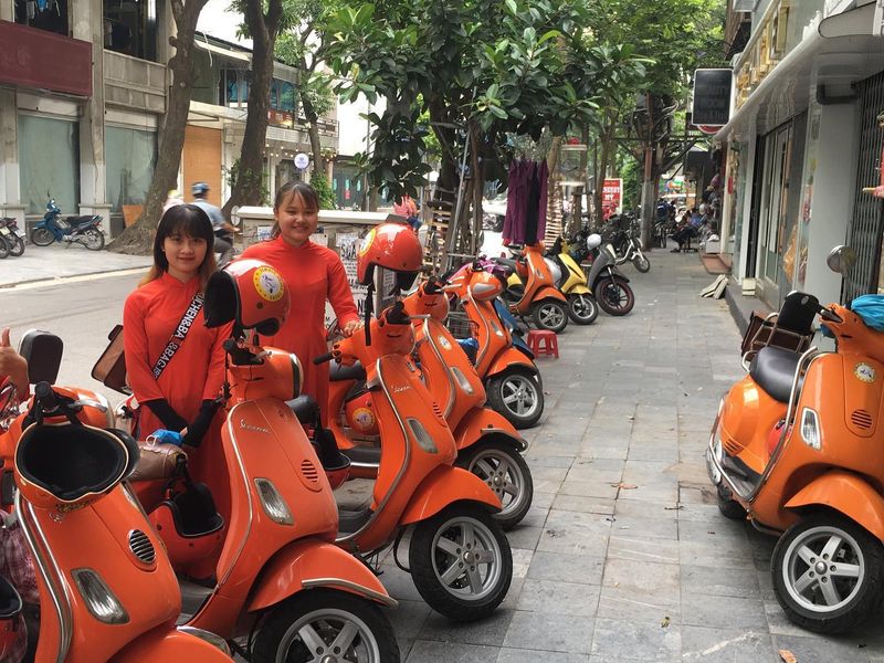 female vespa city tour hanoi 