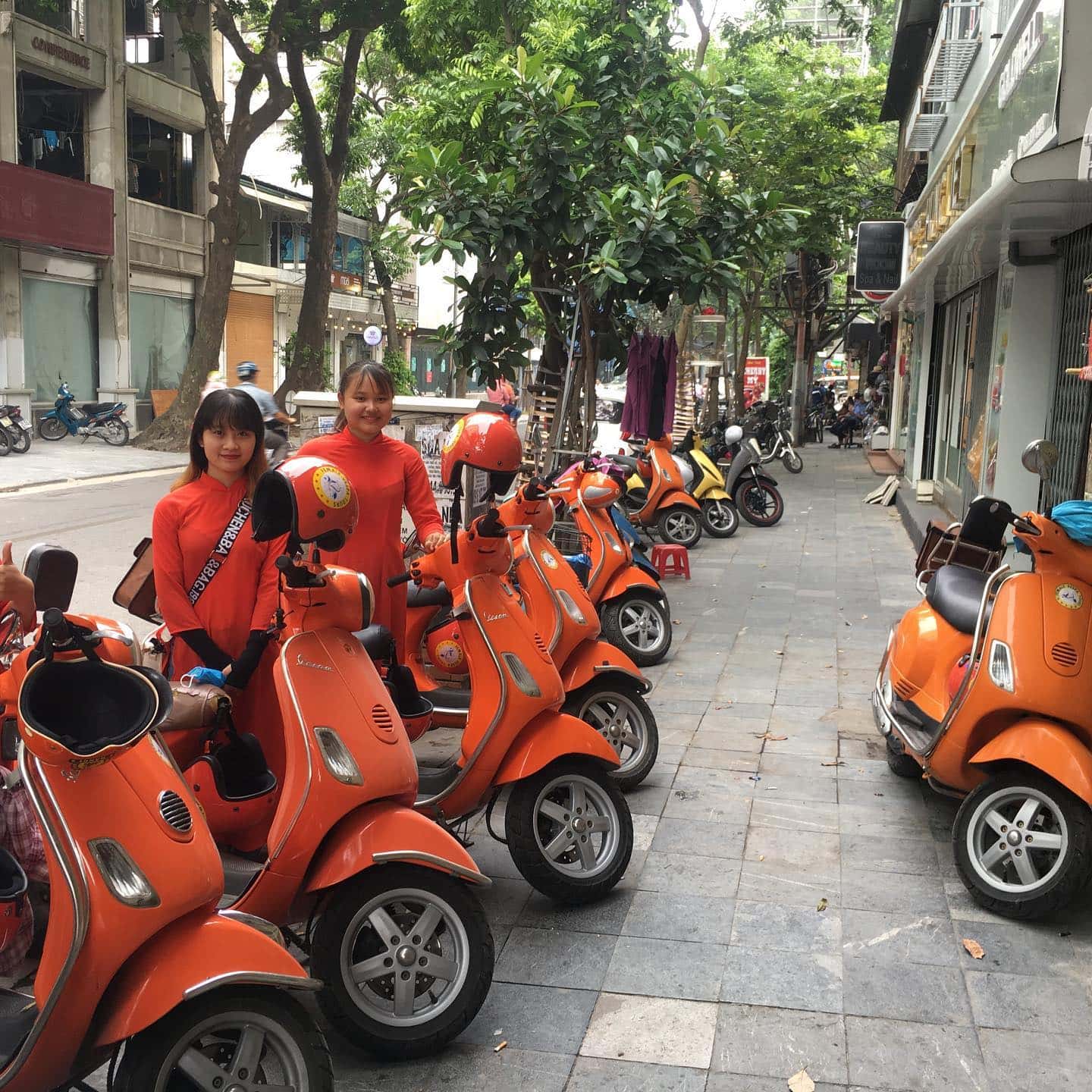 female vespa city tour hanoi 