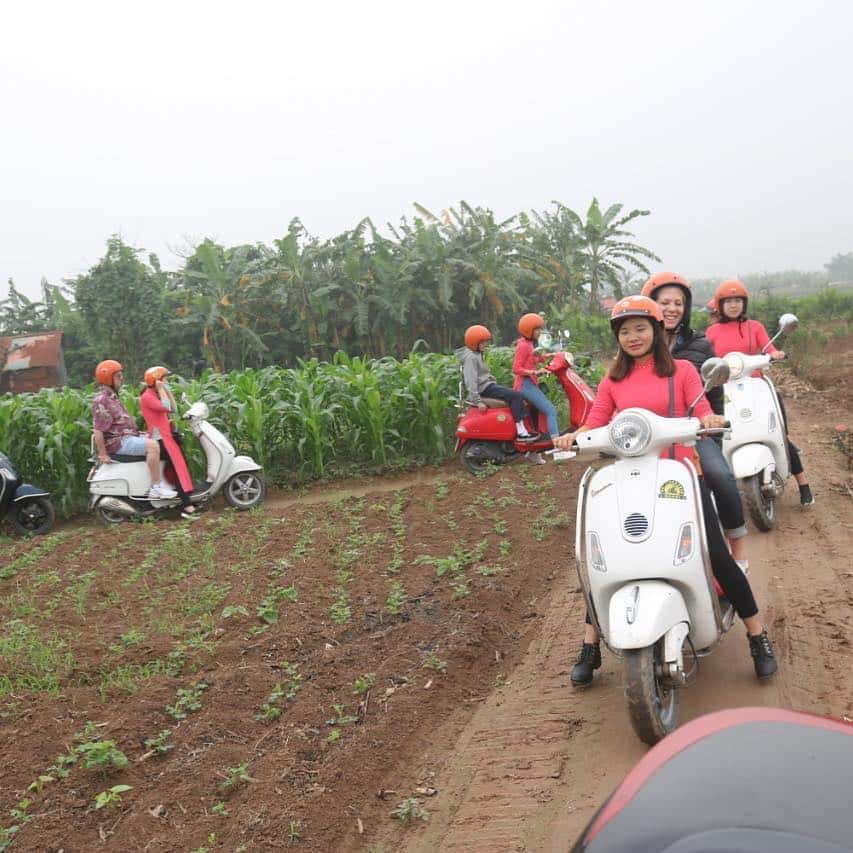 female vespa city tour hanoi 