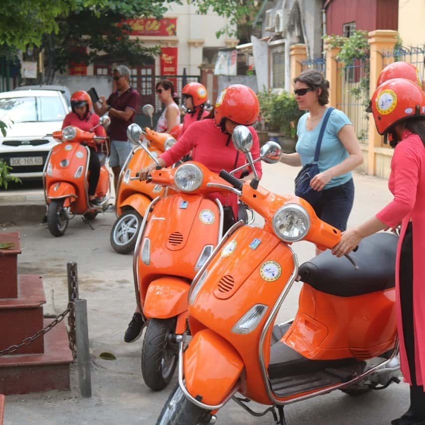 female vespa city tour hanoi 