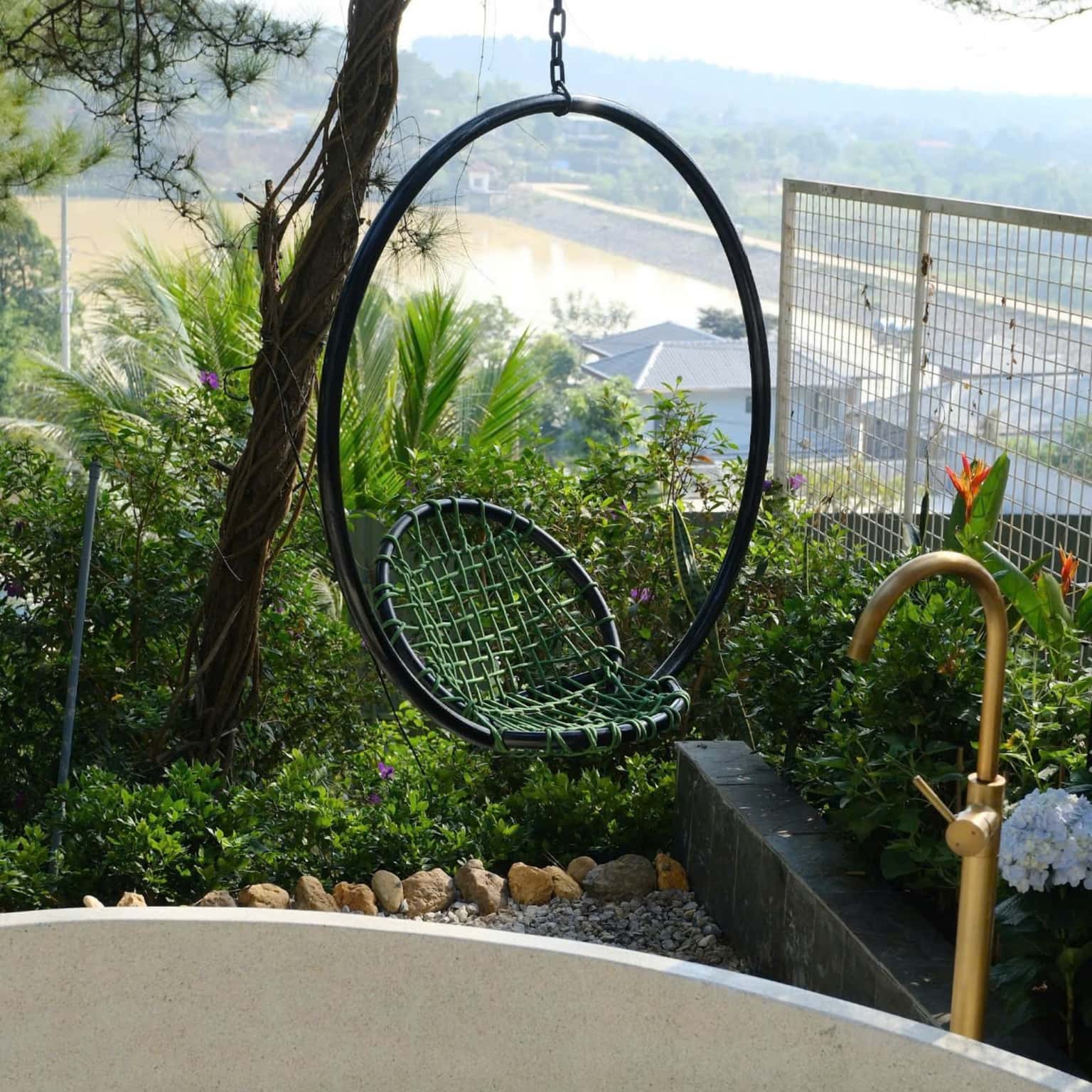 Hanging chair with pine forest view
